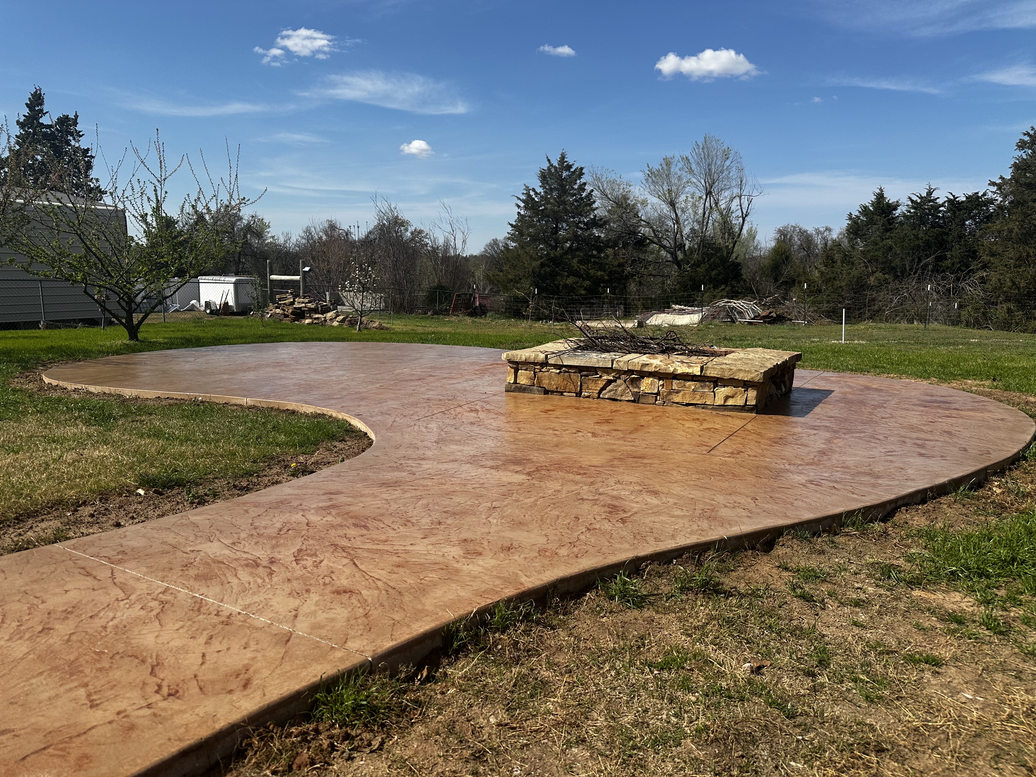 After: Custom fire pit with decorative concrete